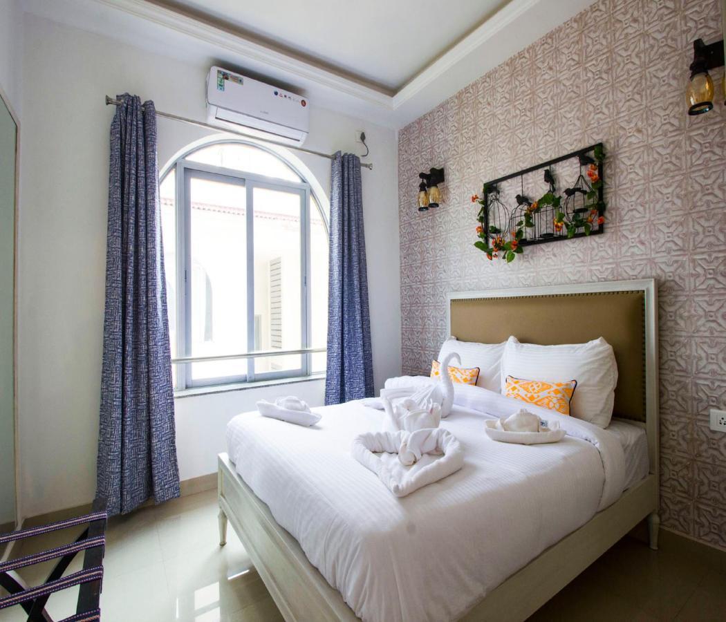 Span Suites & Villa Morjim Exterior foto