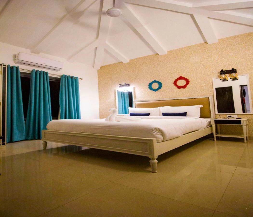 Span Suites & Villa Morjim Exterior foto