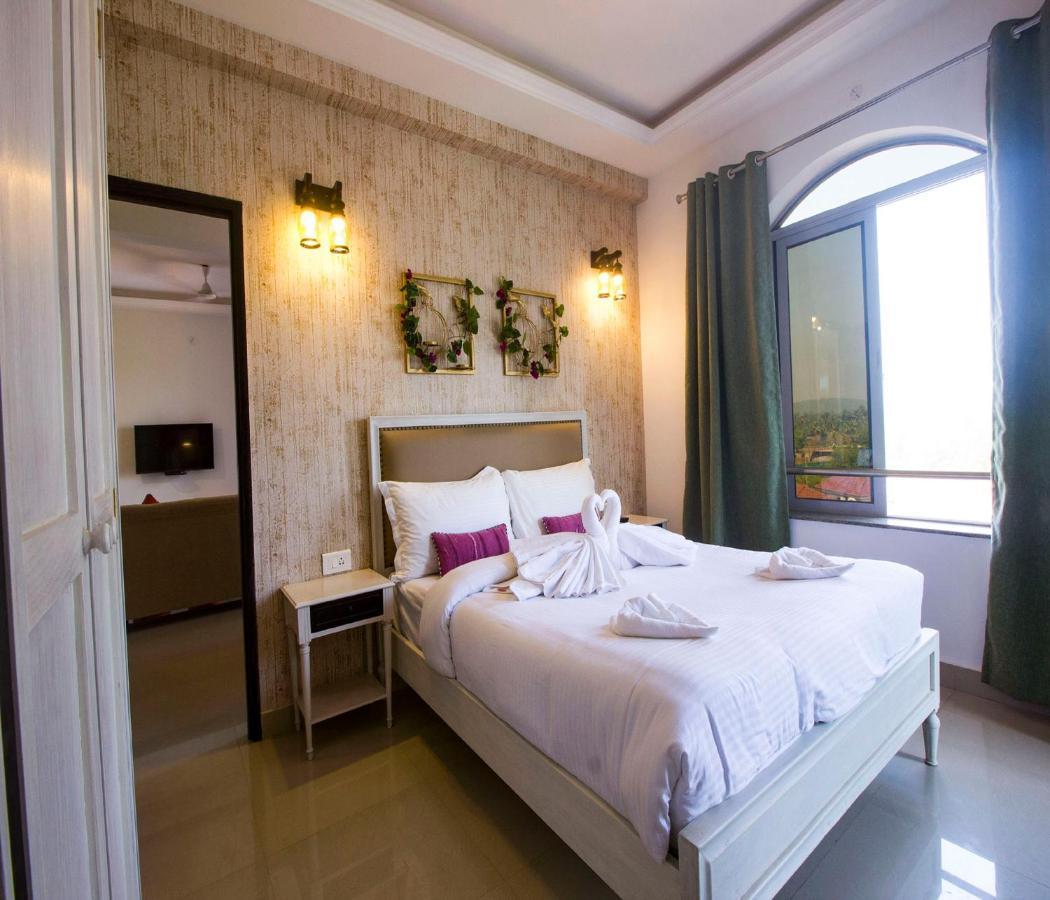Span Suites & Villa Morjim Exterior foto